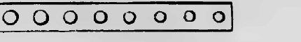 A drawing plate of graded holes, used to draw a dipped candle down to an even, finished size.