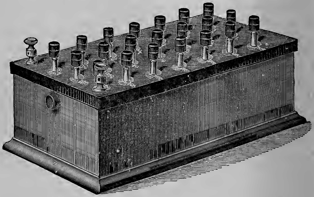 A rheostat: a set of resistance coils that could be adjusted to any value required, contained in a single small case.